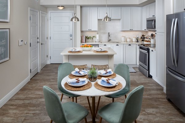 Dining area featuring modern decor at 1333 South Ocean Apartments Perfect space for luxury coastal living experiences