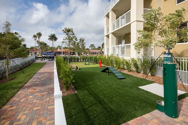 Dog park with agility equipment at 1333 South Ocean Apartments, ideal for pet-friendly living