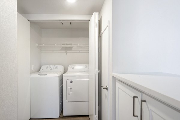 laundry room at Marquessa Villas Apartments