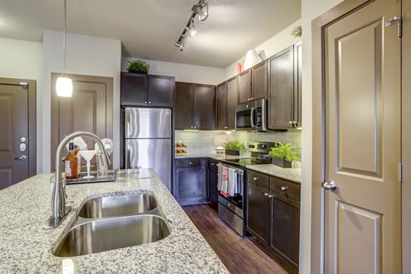 kitchen at Highpoint at Cypresswood Apartments