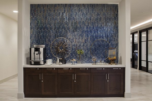 Elegant clubhouse with modern decor at Marvelle at Southcenter Apartments, ideal for social gatherings and relaxation