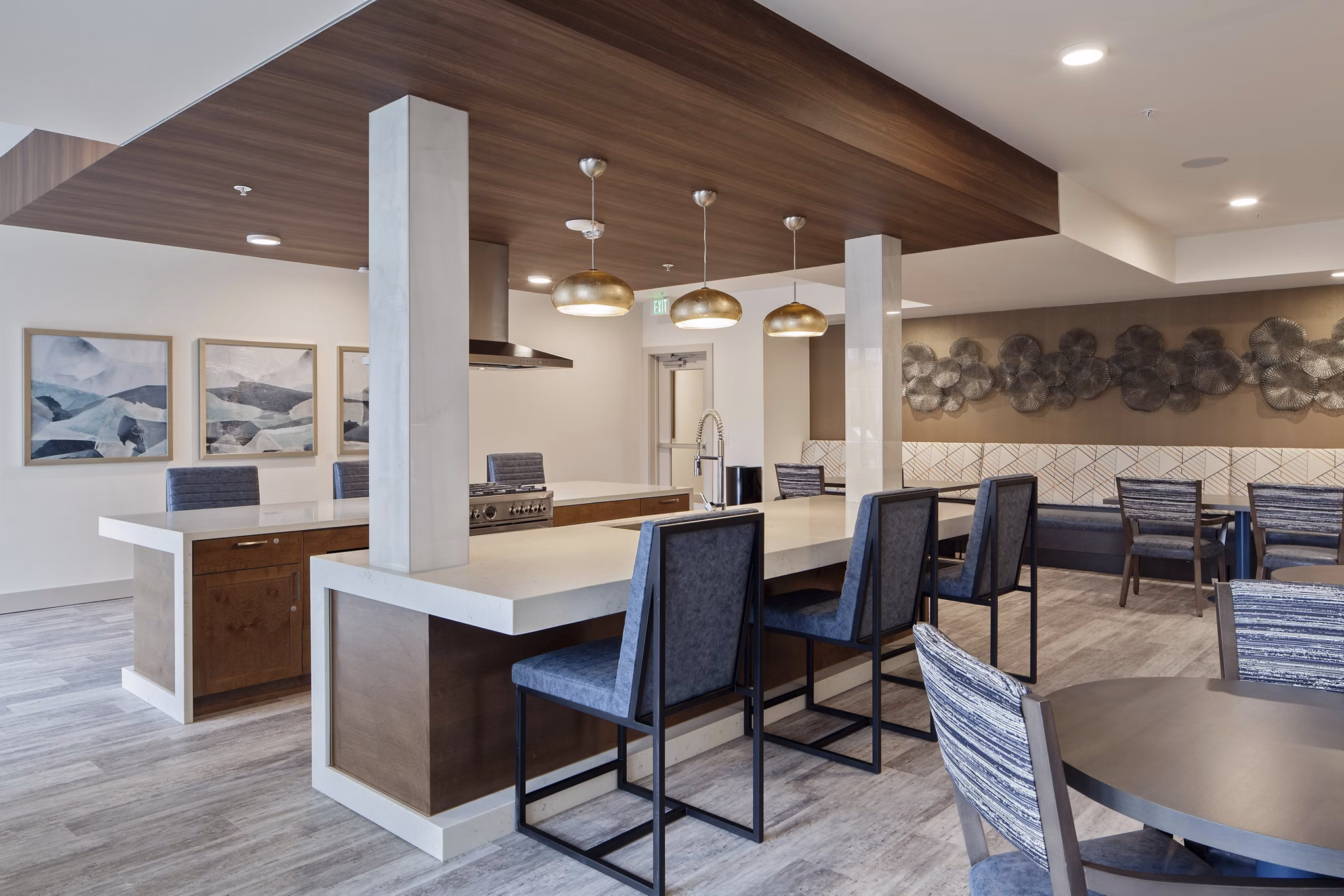 Modern clubhouse featuring cozy lounge areas at Marvelle at Southcenter Apartments