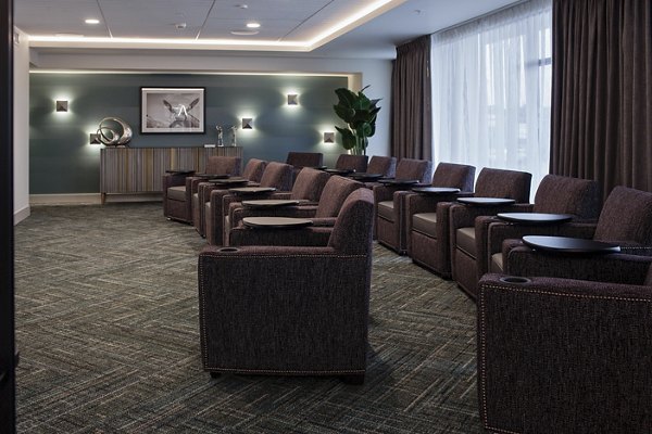 Modern theater with comfortable seating at Marvelle at Southcenter Apartments