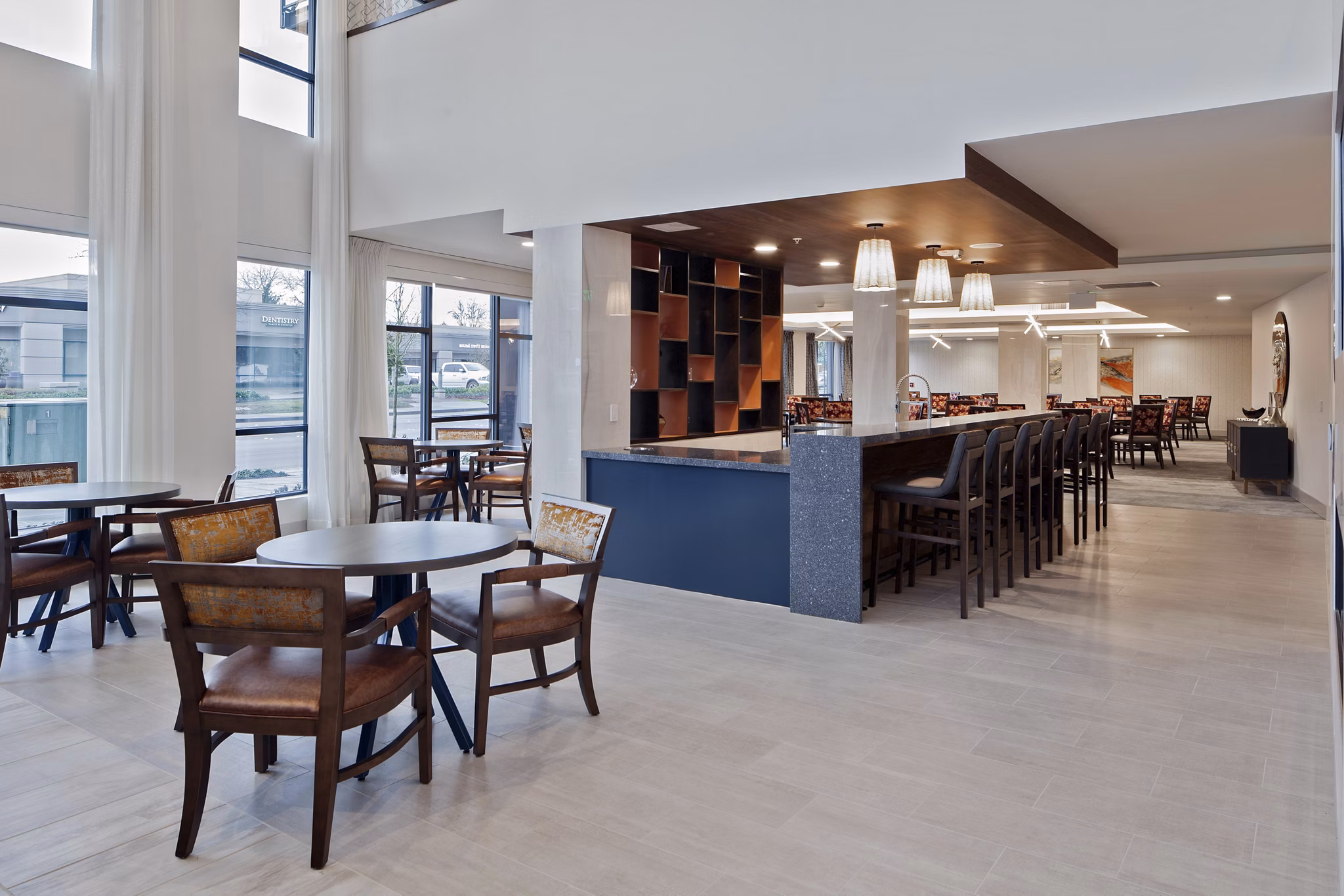 Elegant clubhouse with modern seating and lighting at Marvelle at Southcenter Apartments