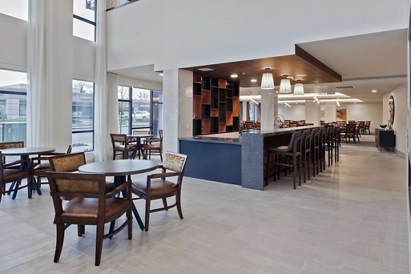 Elegant clubhouse with modern seating and lighting at Marvelle at Southcenter Apartments