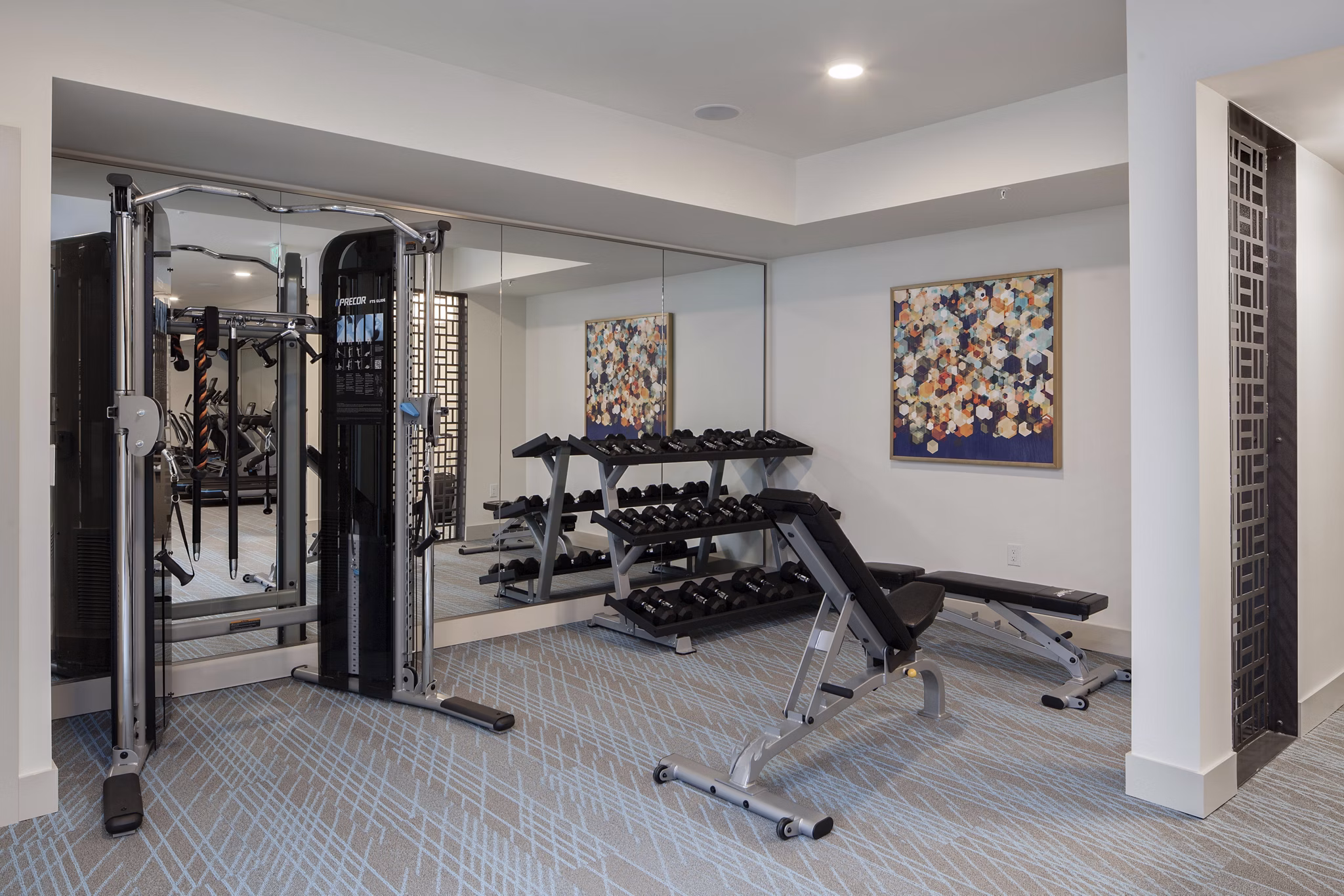 Modern fitness center with state-of-the-art equipment at Marvelle at Southcenter Apartments for active lifestyle enthusiasts