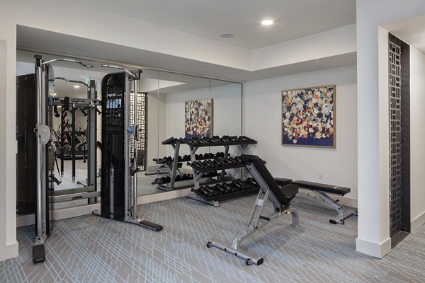 Modern fitness center with state-of-the-art equipment at Marvelle at Southcenter Apartments for active lifestyle enthusiasts