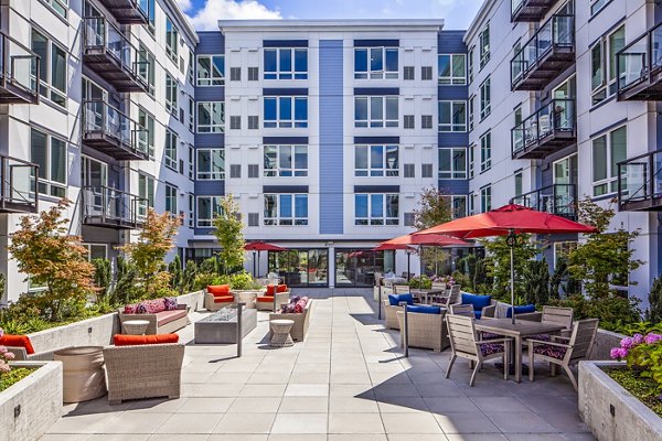 Patio with cozy seating area at Mariblu Southcenter Apartments, ideal for relaxing and entertaining