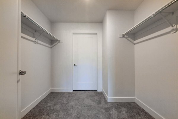 Modern bedroom with stylish decor at Brixton Apartments