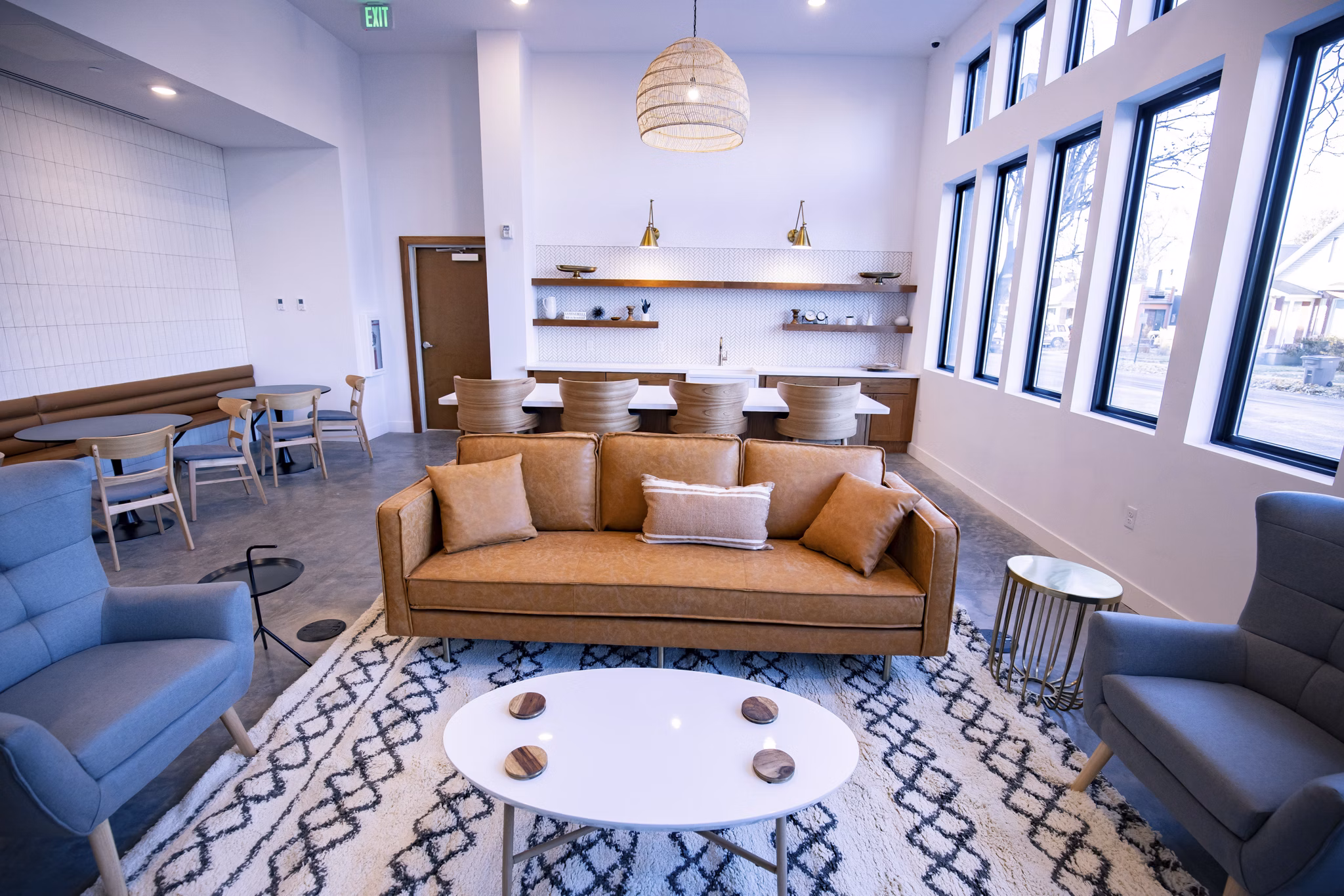 Clubhouse featuring stylish modern design at Brixton Apartments, perfect for social gatherings and events in a luxury setting