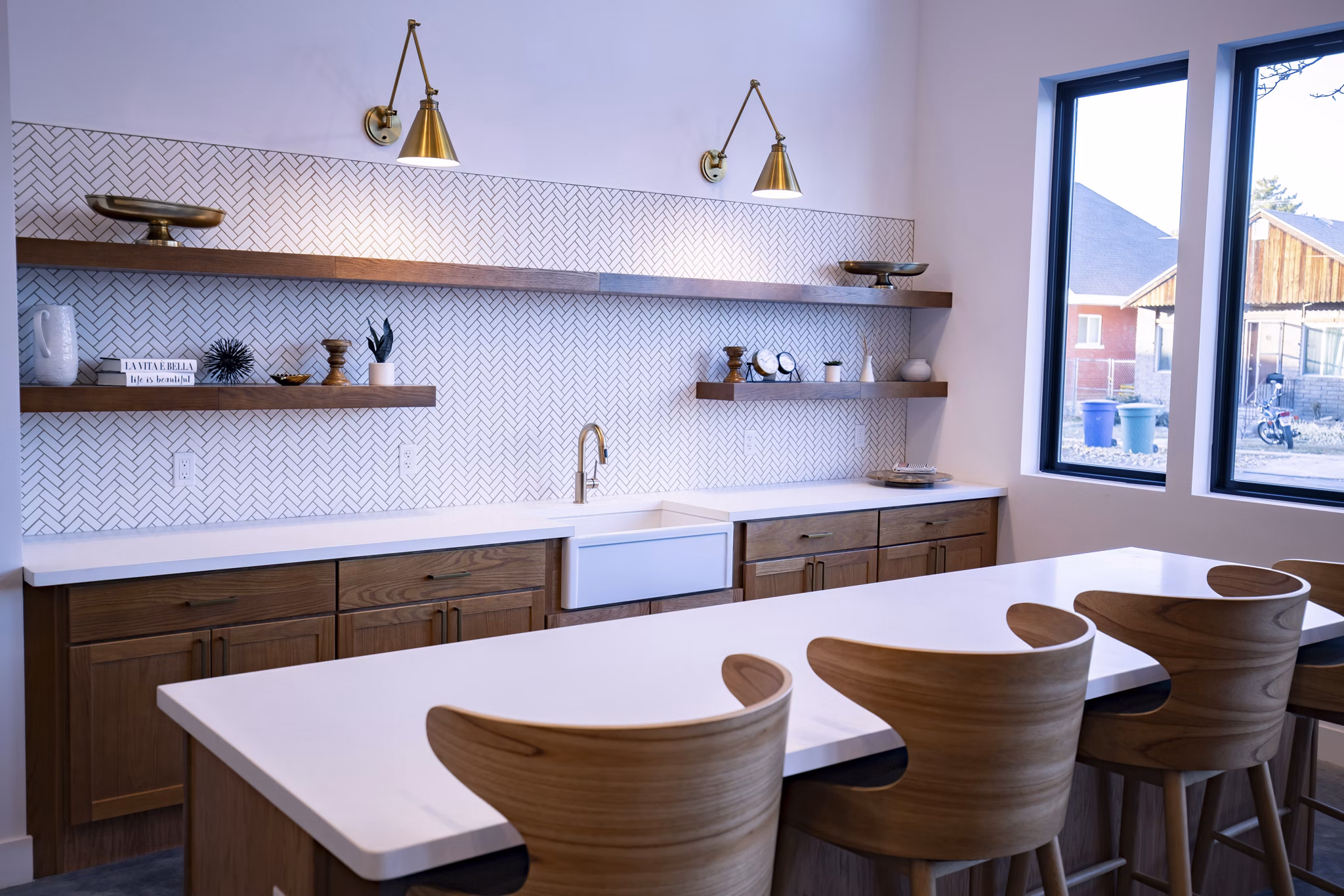 Clubhouse with modern furnishings and ample seating at Brixton Apartments