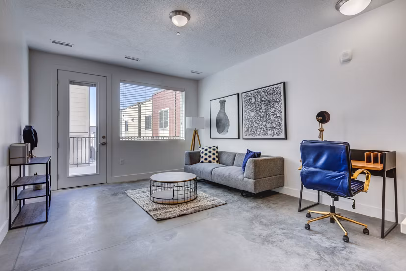Living room showcasing modern decor and open layout at Brixton Apartments