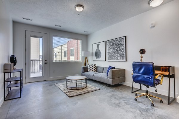 Living room showcasing modern decor and open layout at Brixton Apartments