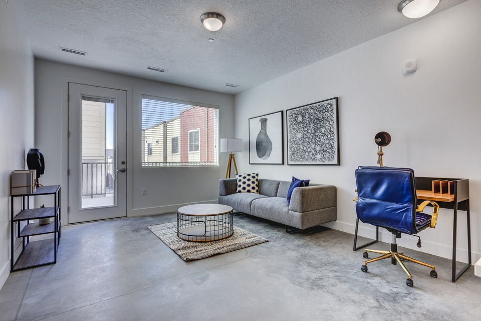 Living room showcasing modern decor and open layout at Brixton Apartments
