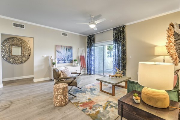 Cozy living room with stylish decor in Ironwood North Apartments