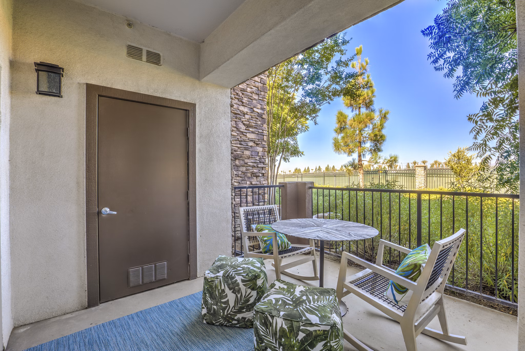 Ironwood North Apartments: Modern patio space at luxury apartments featuring stylish outdoor furniture