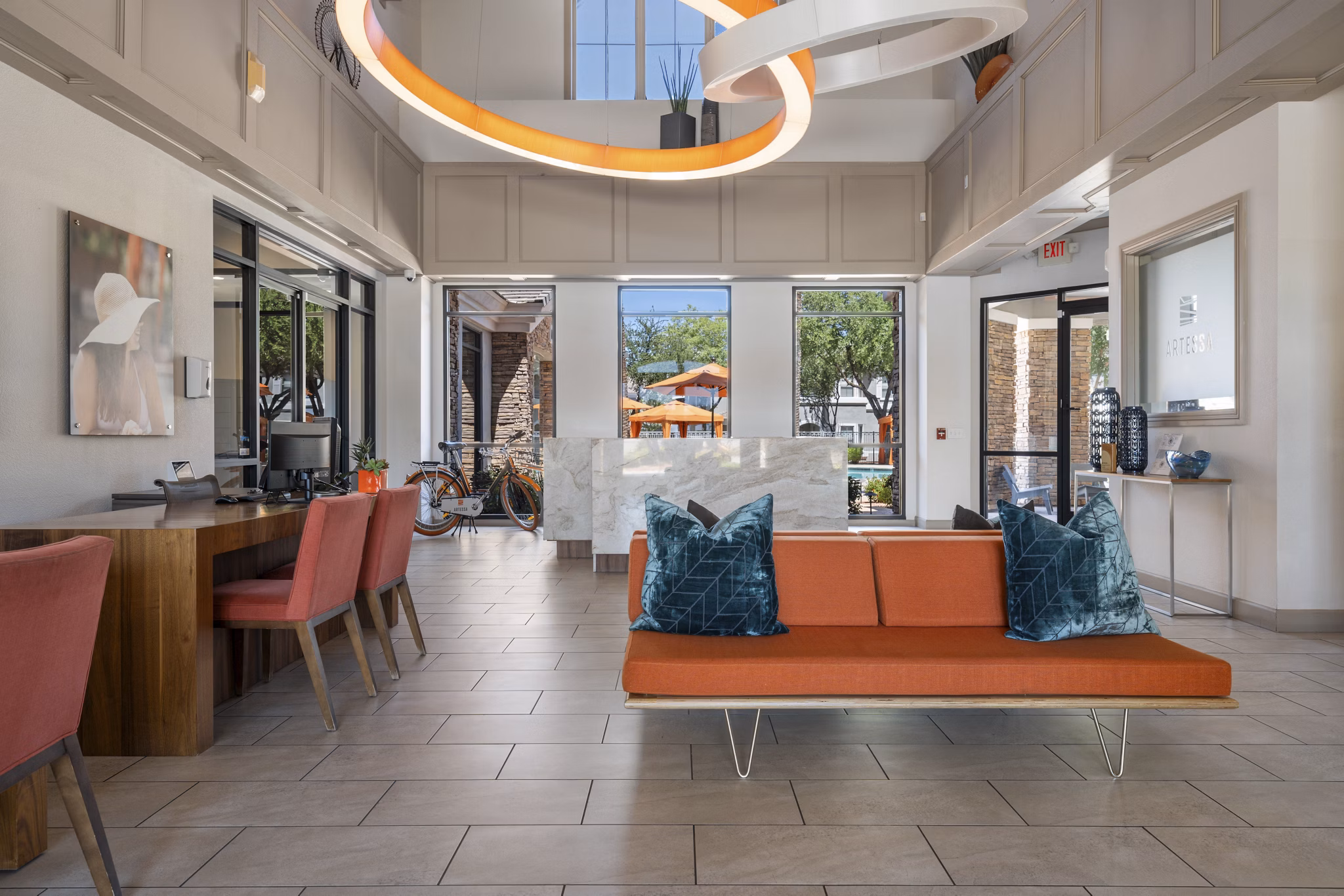 Clubhouse with modern design and cozy seating at Artessa Apartments, offering luxury amenities in a vibrant community