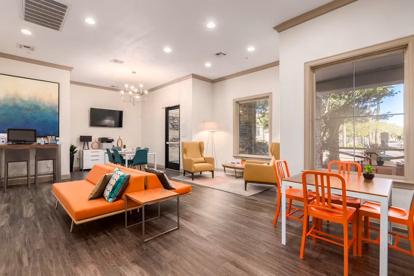 Clubhouse featuring modern dÃ©cor and seating areas at Artessa Apartments luxury community