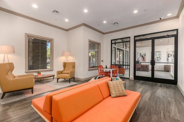 Modern clubhouse with lounge seating at Artessa Apartments
