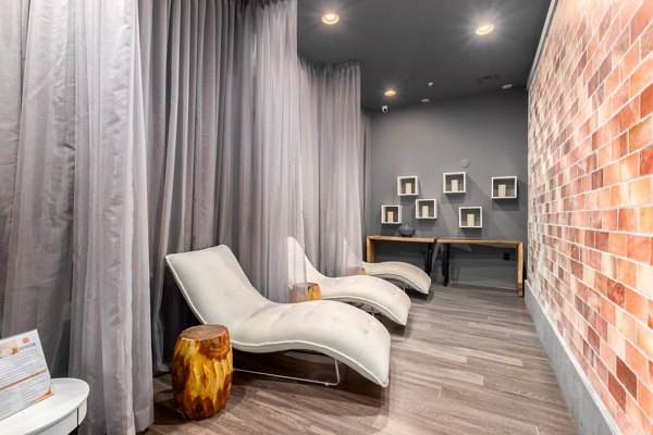Stylish clubhouse with modern interiors at Artessa Apartments, a Greystar luxury living community