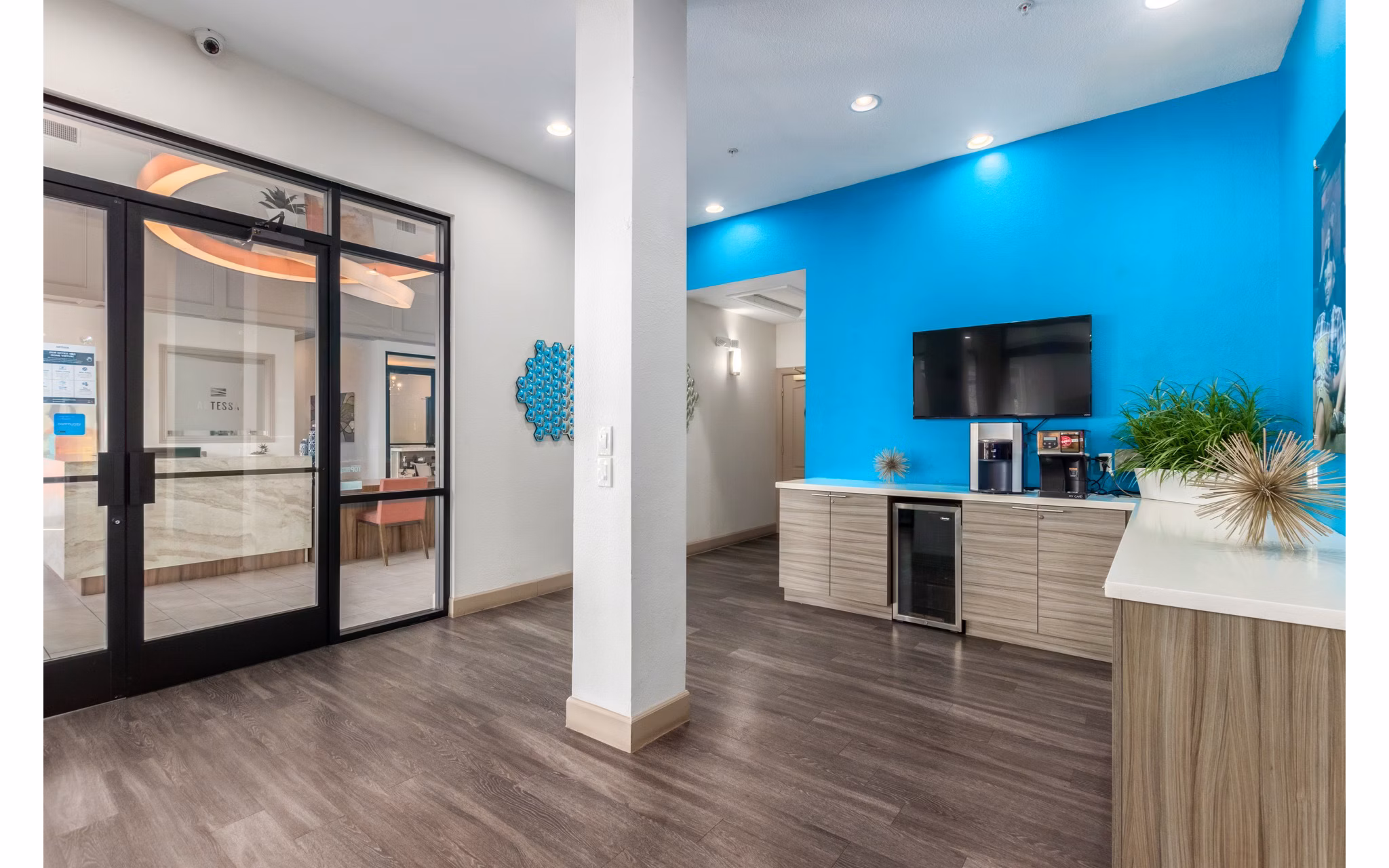 Artessa Apartments: Elegant clubhouse with modern design and comfortable seating in luxury complex