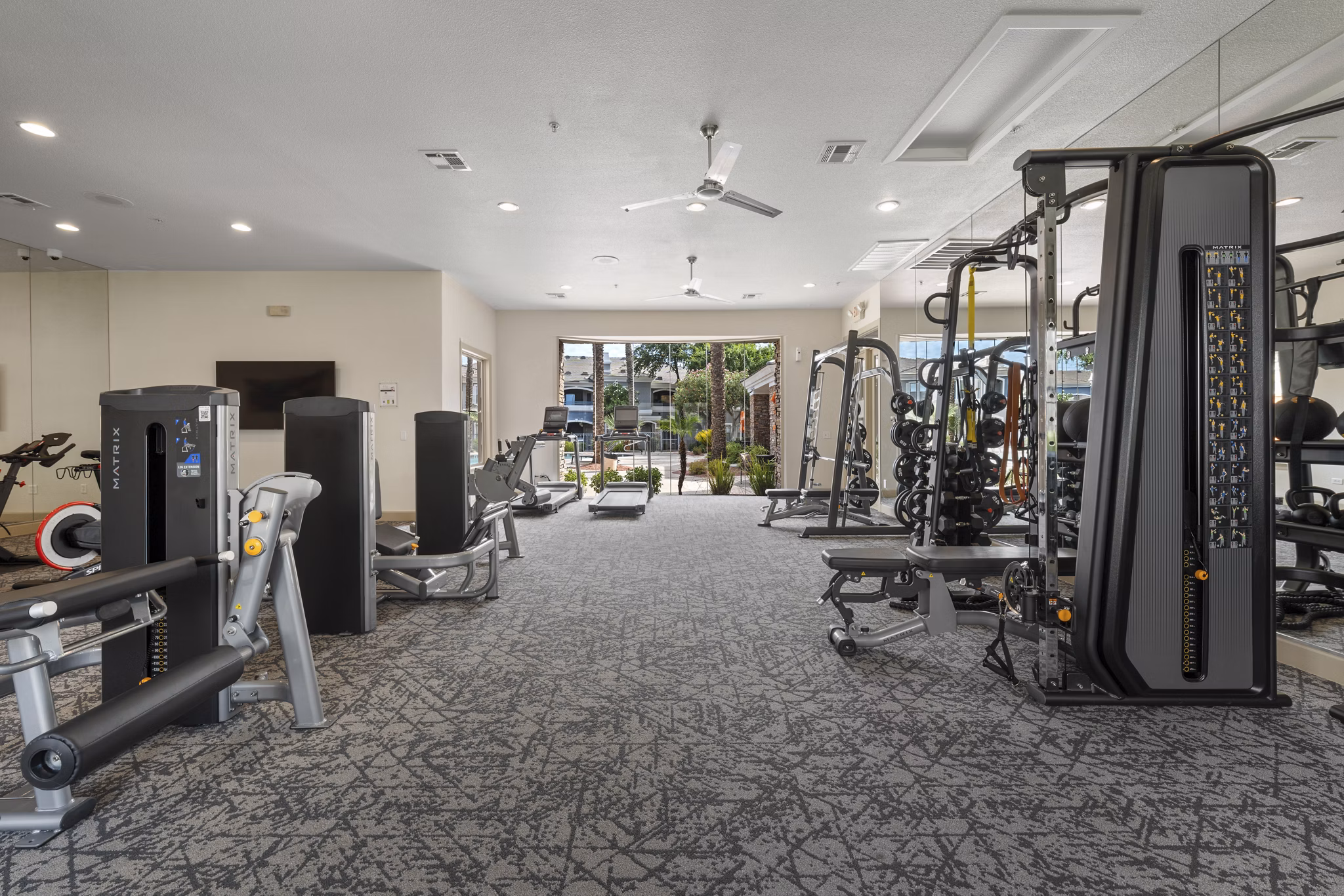 Modern fitness center with state-of-the-art equipment at Artessa Apartments