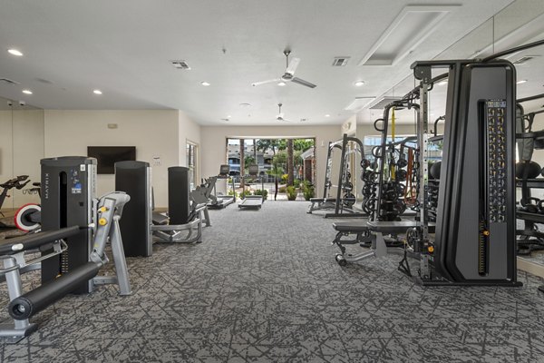 Modern fitness center with state-of-the-art equipment at Artessa Apartments