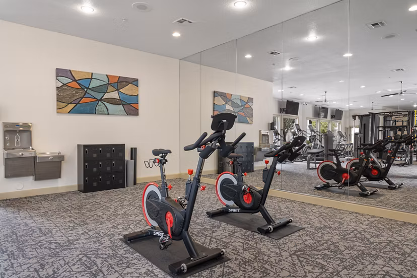 State-of-the-art fitness center at Artessa Apartments with modern equipment and spacious workout areas