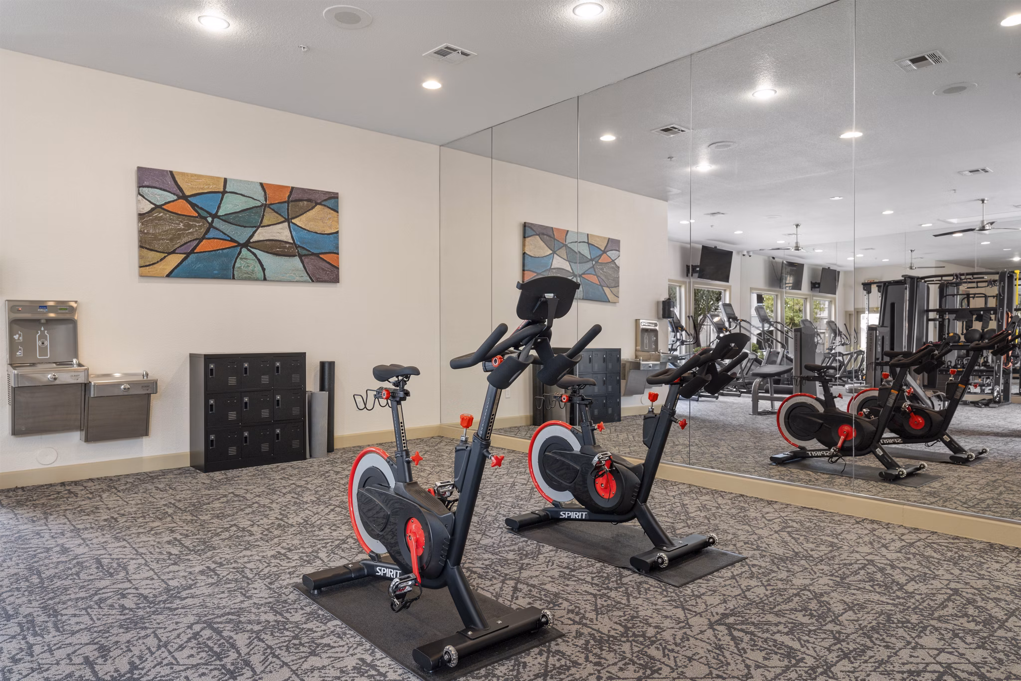 State-of-the-art fitness center at Artessa Apartments with modern equipment and spacious workout areas