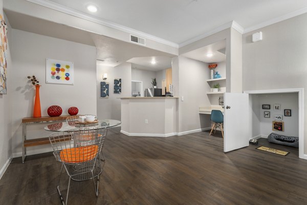 Spacious living room with modern decor at Artessa Apartments, luxury living in the heart of the city