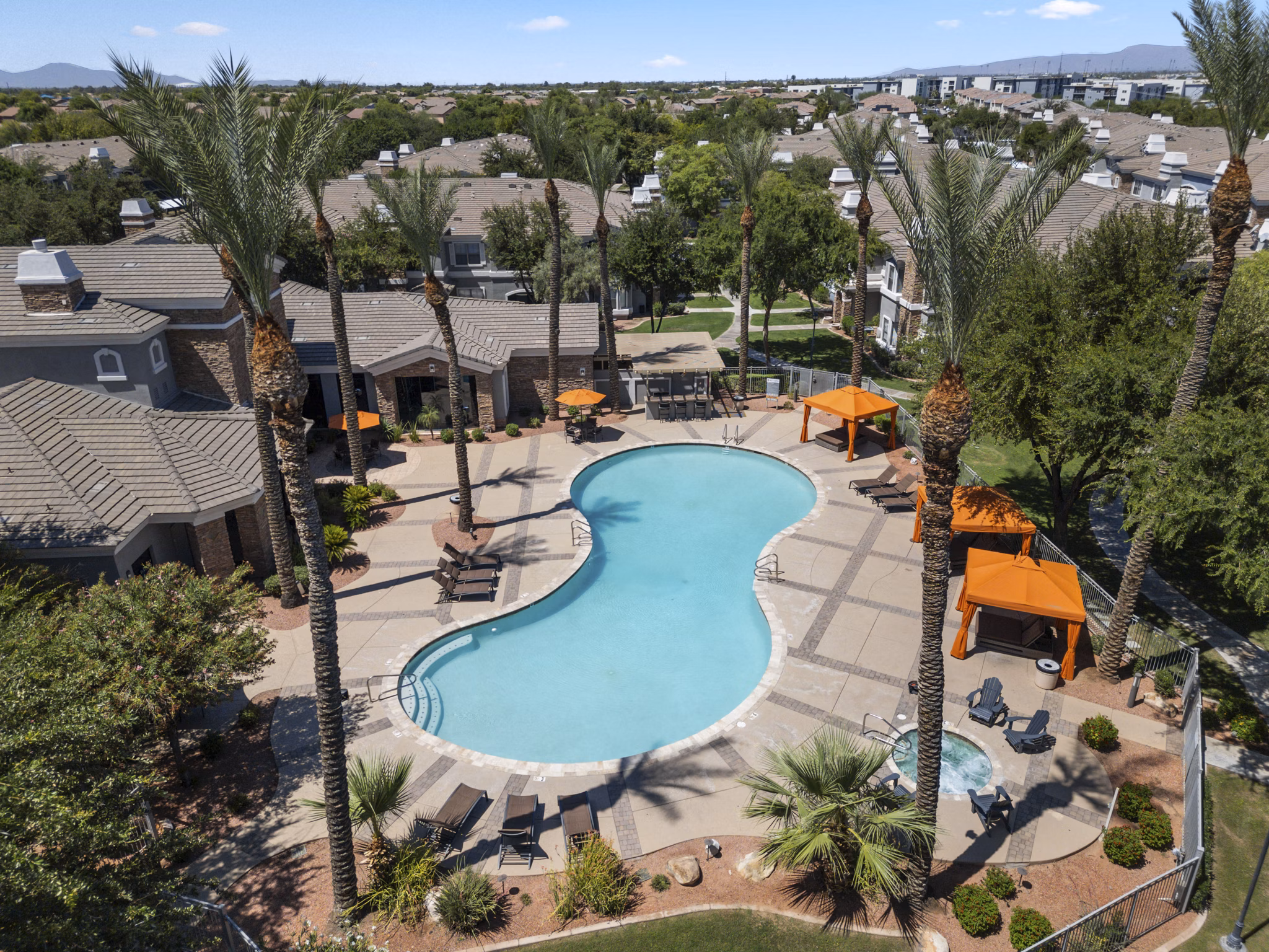 Luxury pool with sun loungers at Artessa Apartments, perfect for relaxation and leisure