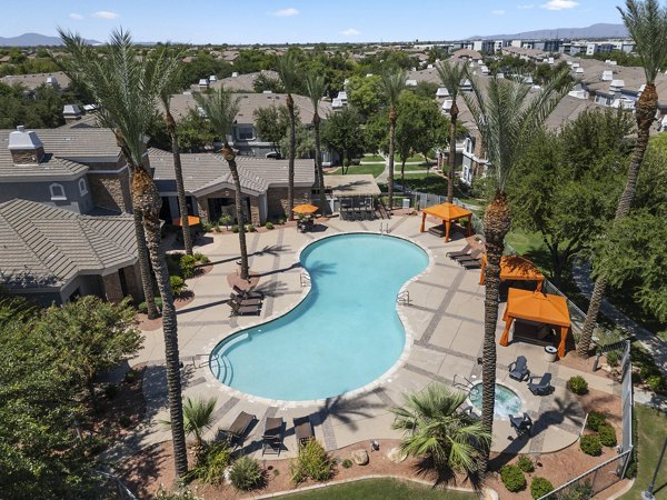 Luxury pool with sun loungers at Artessa Apartments, perfect for relaxation and leisure