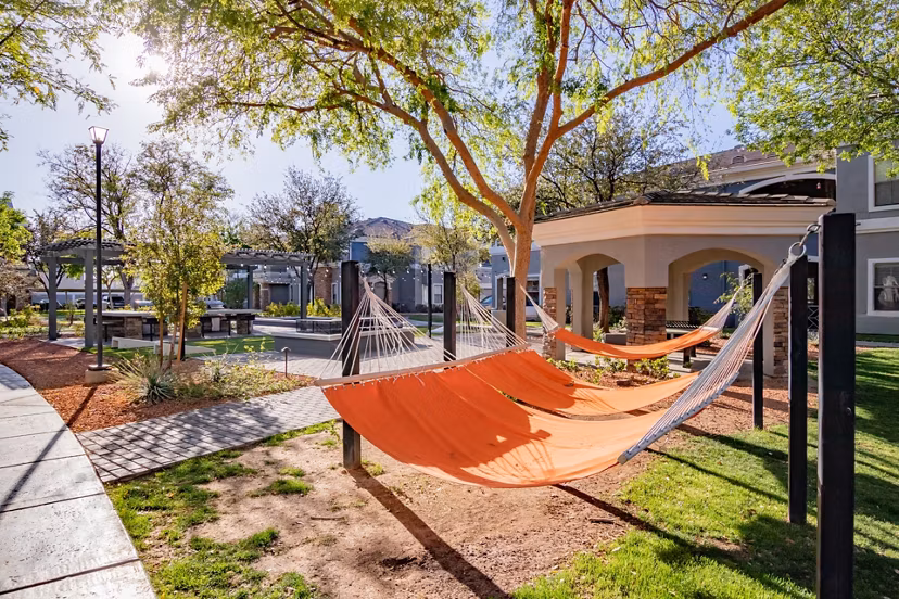 Serene courtyard with lush landscaping at Artessa Apartments, a luxurious living community