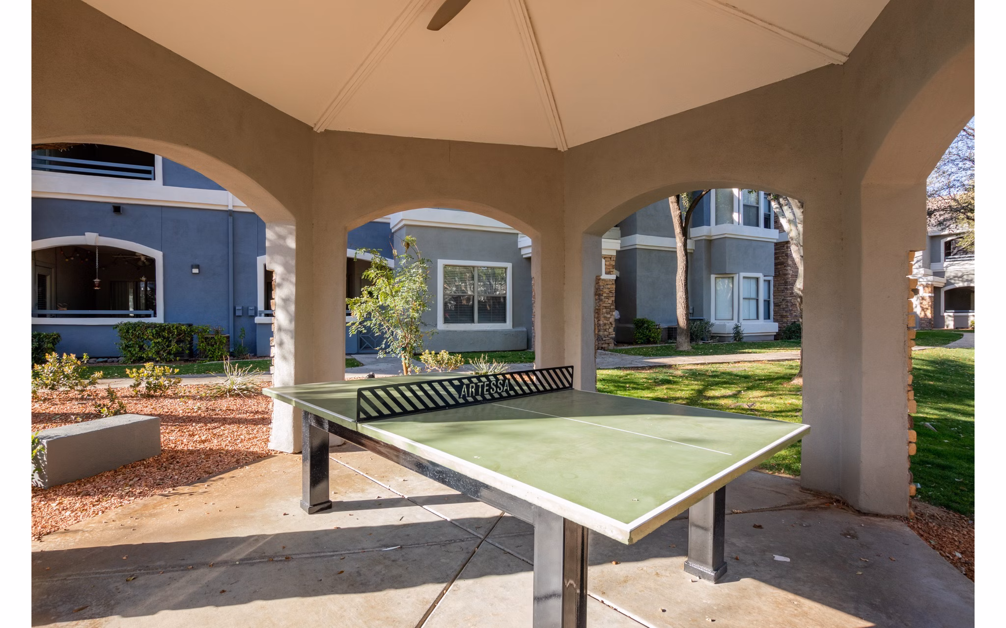 Cozy patio with modern furniture at Artessa Apartments