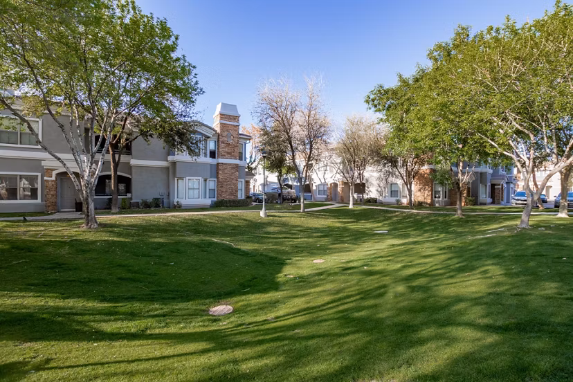 Tranquil courtyard with lush greenery at Artessa Apartments, offering a serene escape within luxury living