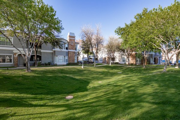 Tranquil courtyard with lush greenery at Artessa Apartments, offering a serene escape within luxury living