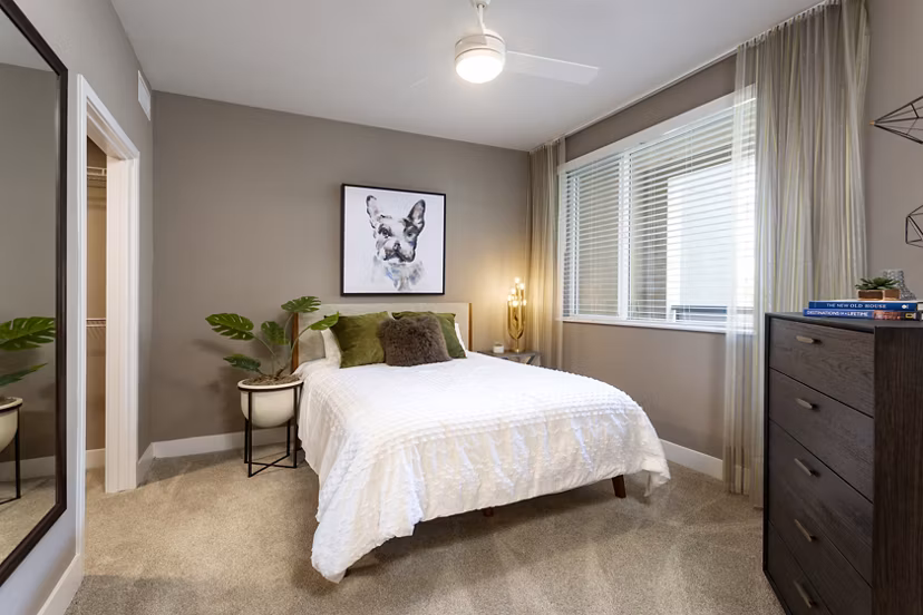Cozy bedroom with modern decor at Jefferson Rise Apartments