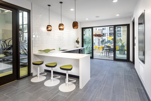 Spacious clubhouse with modern decor at Jefferson Rise Apartments