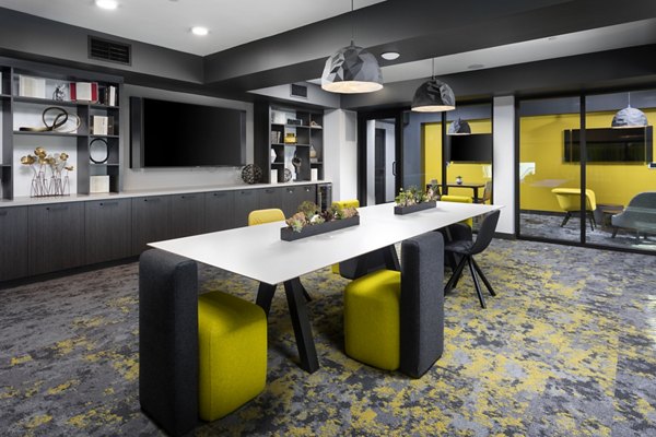 Clubhouse featuring modern design and comfortable seating at Jefferson Rise Apartments