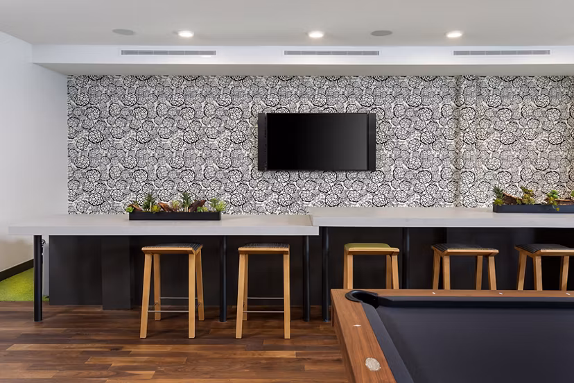 Modern clubhouse with sleek decor at Jefferson Rise Apartments, featuring luxurious seating areas and communal spaces in this vibrant community