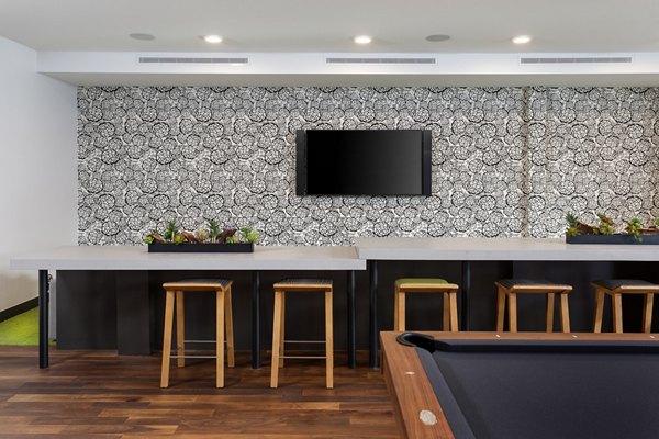 Modern clubhouse with sleek decor at Jefferson Rise Apartments, featuring luxurious seating areas and communal spaces in this vibrant community