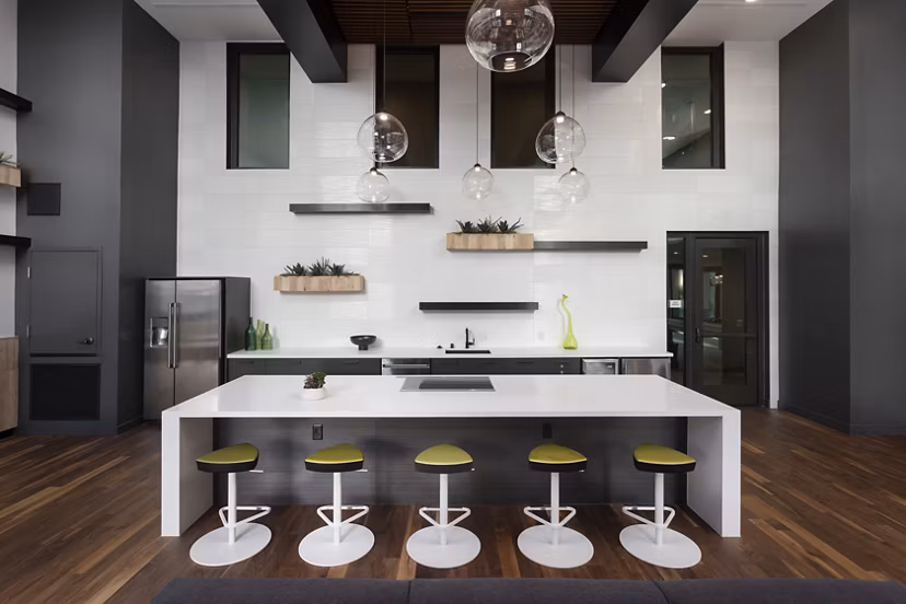 Modern clubhouse with cozy seating areas at Jefferson Rise Apartments, ideal for social gatherings and community events in a luxurious setting