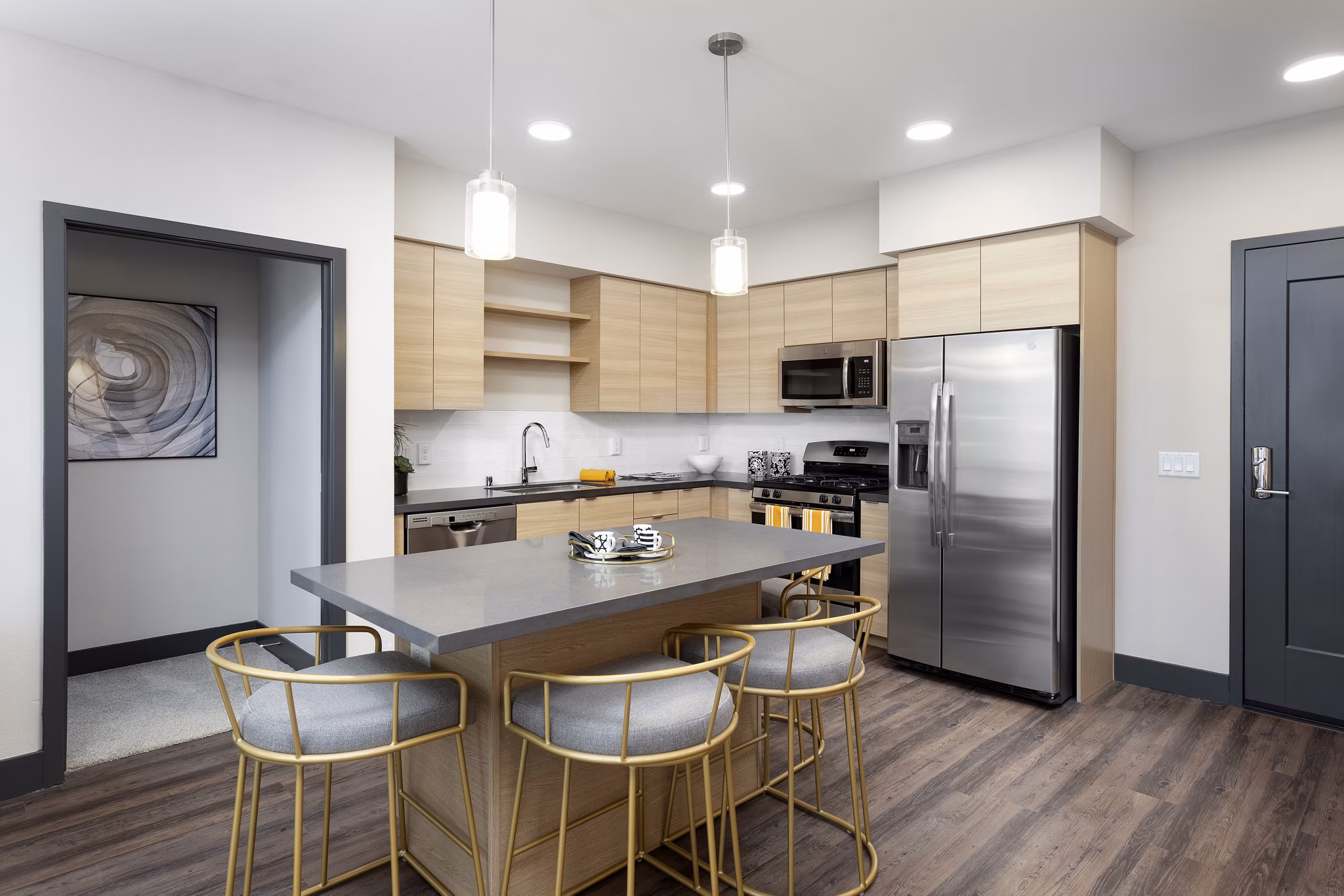 Modern kitchen with stainless steel appliances at Jefferson Rise Apartments