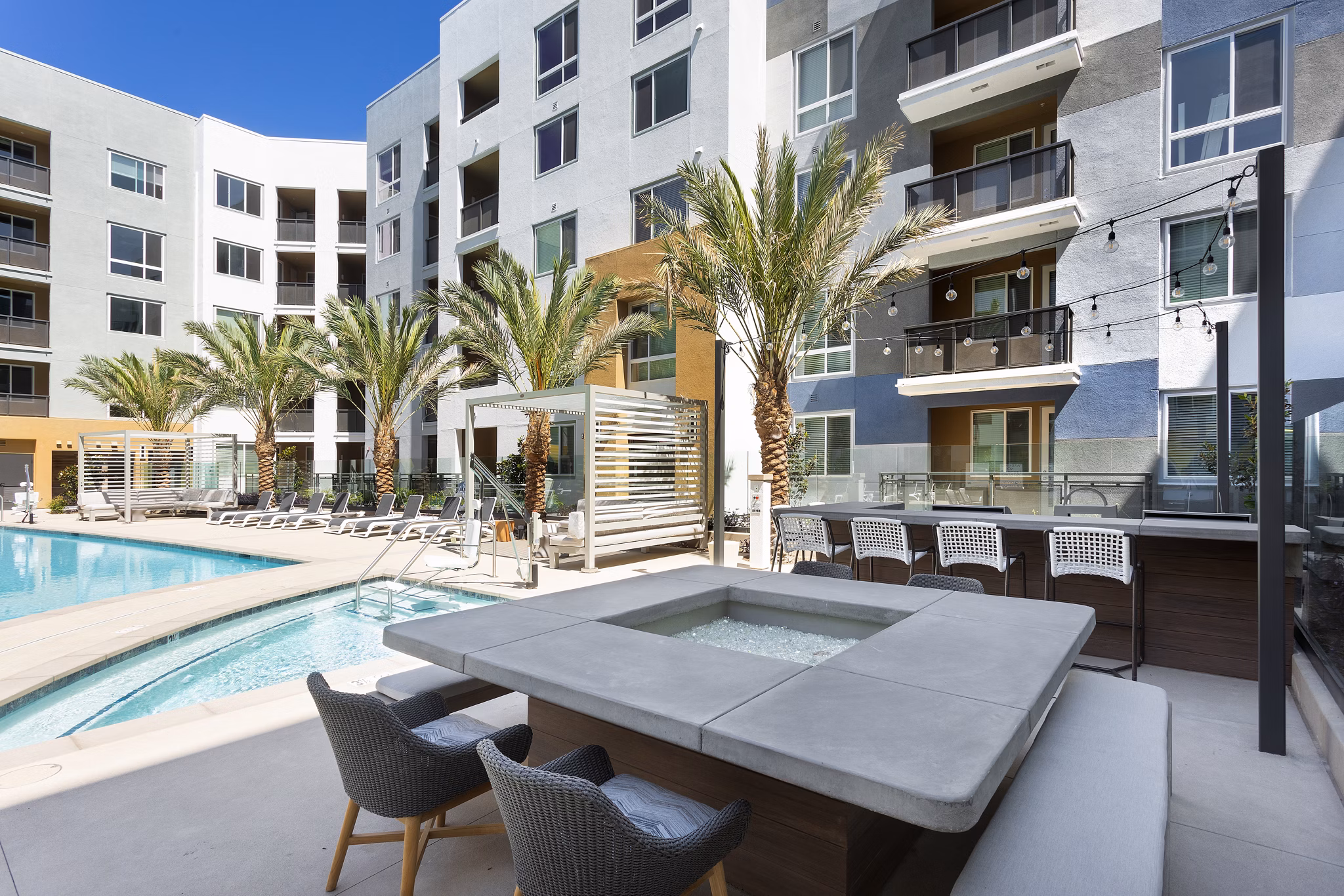 Cozy outdoor fire pit at Jefferson Rise Apartments, a luxury Greystar community