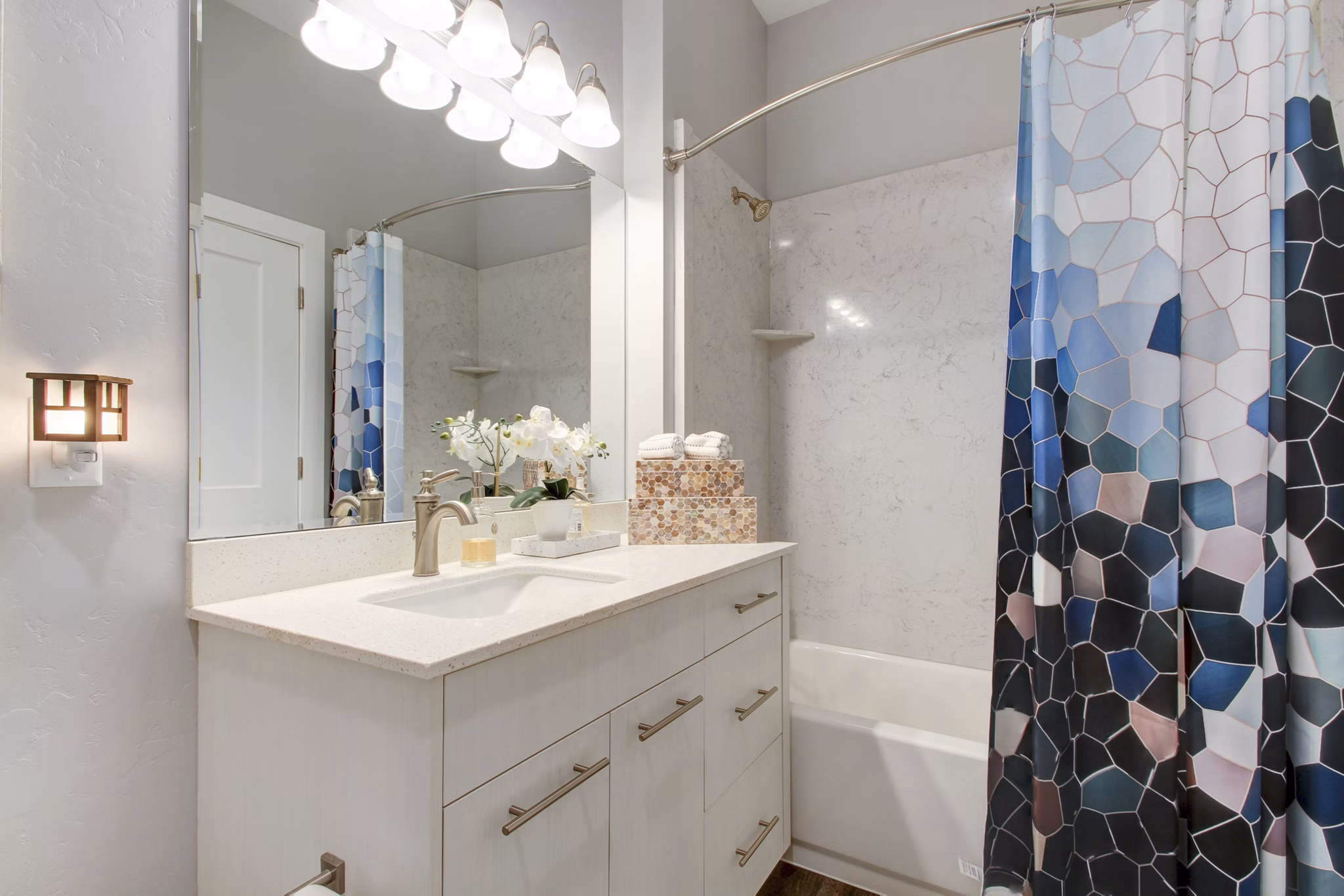 Modern bathroom with sleek fixtures at Park East Apartments luxury residences