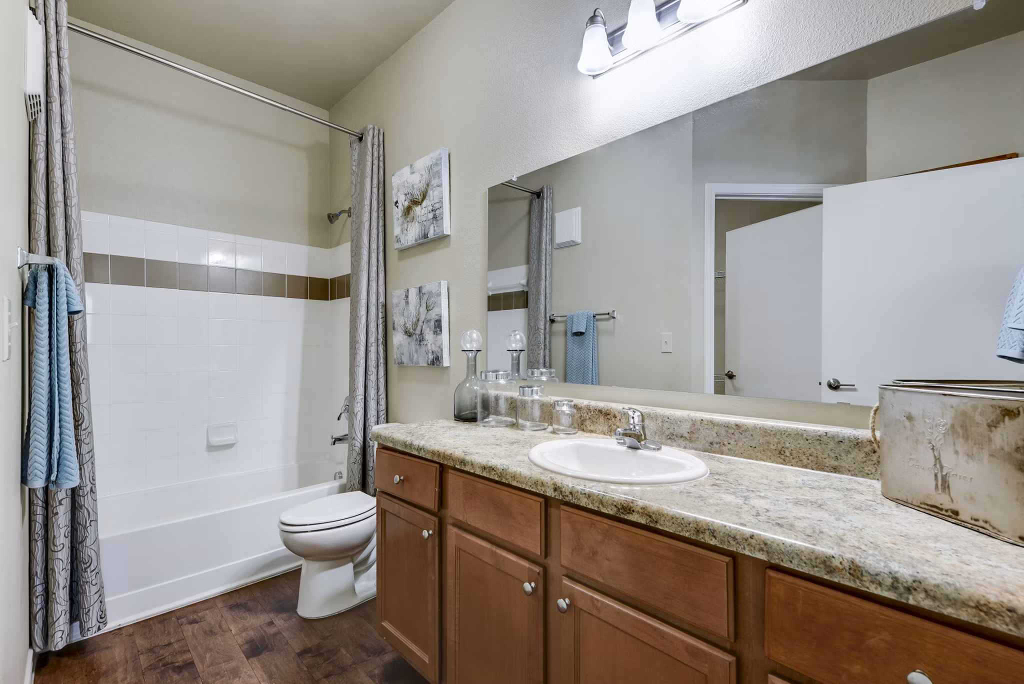 Contemporary bathroom featuring elegant fixtures at Judson Pointe Apartments, perfect for luxury living