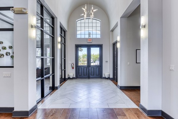 Contemporary clubhouse lobby with modern decor at Judson Pointe Apartments