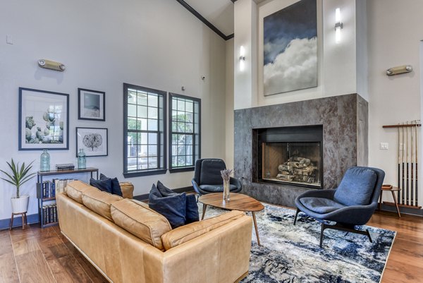 Clubhouse with modern furnishings at Judson Pointe Apartments, featuring a welcoming lobby space for residents to relax and socialize