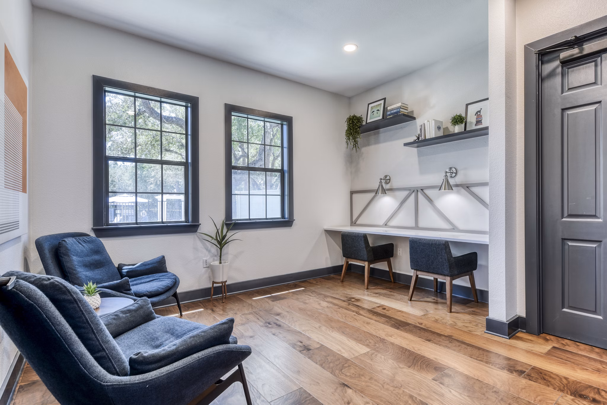 Modern business center with workstations at Judson Pointe Apartments clubhouse