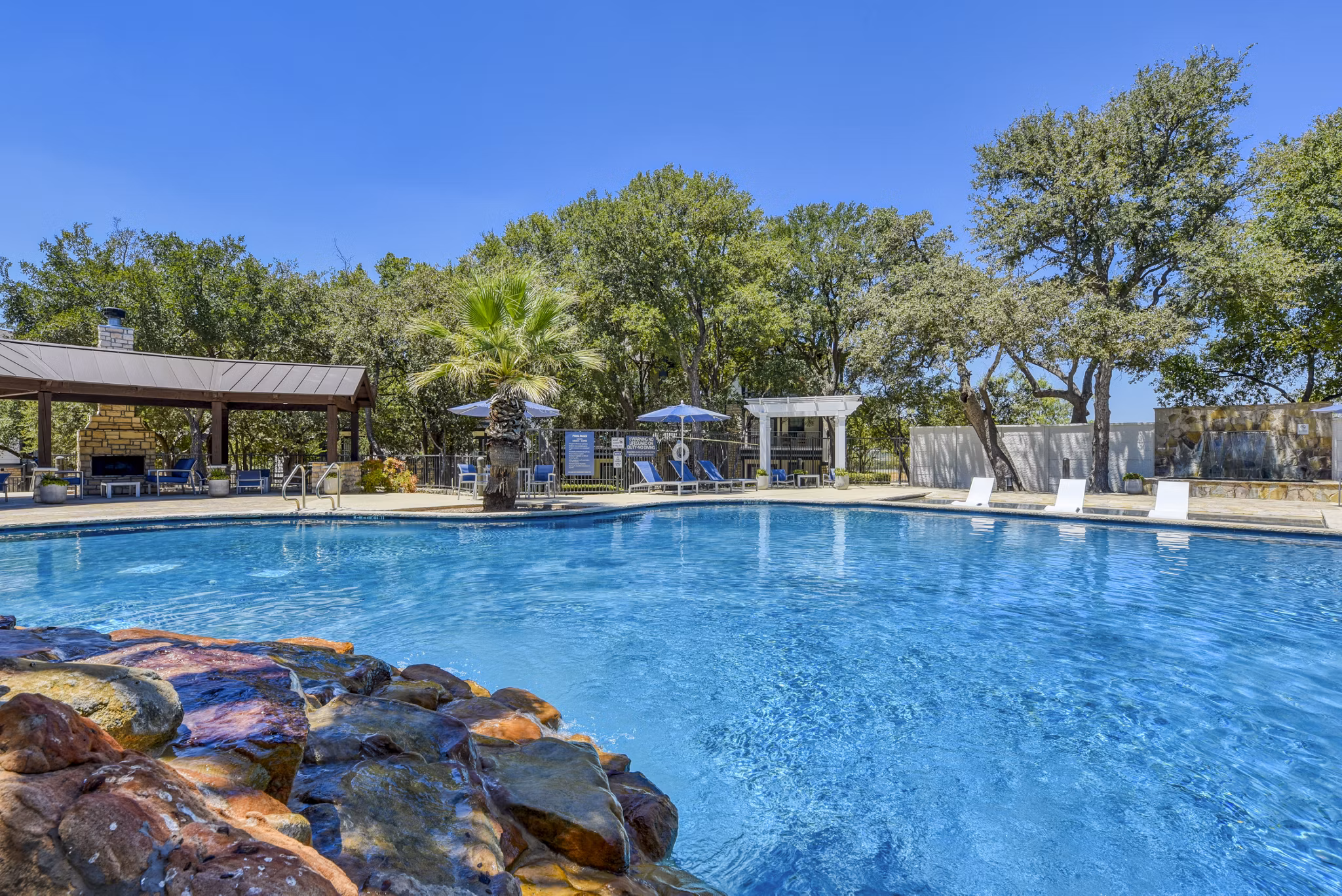 Modern pool at Judson Pointe Apartments offering relaxing views and luxury amenities for residents